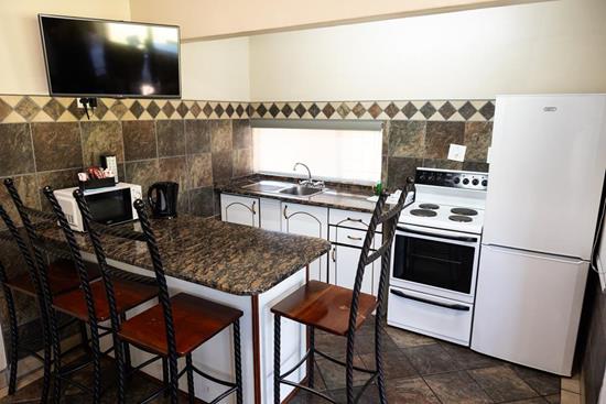 Warmbaths, A Forever Resort: 6-Sleeper Chalet. 2 bedrooms (1 double bed, 2 single beds & 1 double sleeper couch)